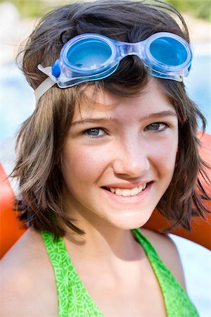 swimming suits for 12 years old girls - Close-Up of Girl Wearing Goggles Stock Photo - Premium Royalty-Free, Code: 600-03059254