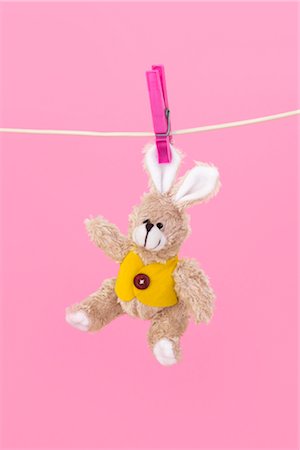 stuffed - Stuffed Rabbit on Clothesline Stock Photo - Premium Royalty-Free, Code: 600-03067874