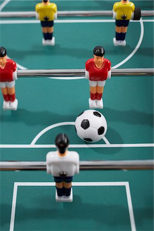 playing table soccer - Table Soccer Stock Photo - Premium Royalty-Free, Code: 600-03069331
