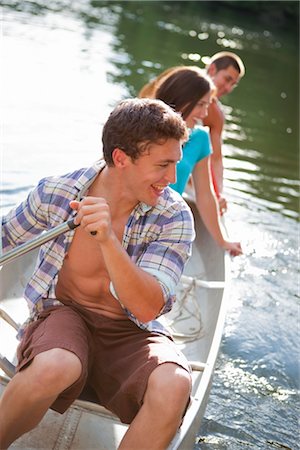 Teenagers Canoeing on Lake Near Portland, Oregon, USA Stock Photo - Premium Royalty-Free, Code: 600-03210548