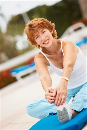 Woman Stretching Stock Photo - Premium Royalty-Free, Code: 600-03227498