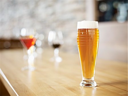 restaurant bar counters - Still Life of Glass of Beer at Wine Bar, Toronto, Ontario, Canada Stock Photo - Premium Royalty-Free, Code: 600-03230245