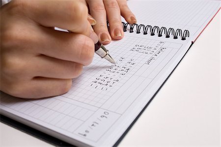 Close-up of Woman's Hands Writing in Book Foto de stock - Sin royalties Premium, Código: 600-03244035