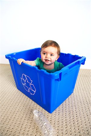 Baby Girl in Recycling Bin Stock Photo - Premium Royalty-Free, Code: 600-03265821