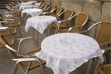 sidewalk cafe empty - Tables and Chairs, El Rastro Market, Madrid, Spain Stock Photo - Premium Royalty-Free, Code: 600-03289997