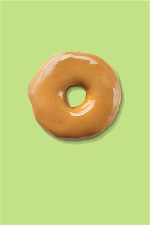 simsearch:600-03003544,k - Maple Dipped Donut Stock Photo - Premium Royalty-Free, Code: 600-03295307