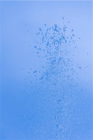 stop-action - Drops of water fountain against blue sky, Salzburg, Austria Fotografie stock - Premium Royalty-Free, Codice: 600-03298870