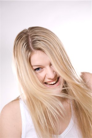 Blond Woman in Studio Stock Photo - Premium Royalty-Free, Code: 600-03404065