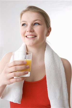 sweaty tank top - Woman with Glass of Juice Stock Photo - Premium Royalty-Free, Code: 600-03404073