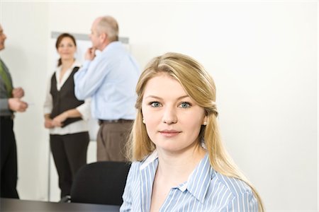 Blond Businesswoman in Meeting Stock Photo - Premium Royalty-Free, Code: 600-03404532