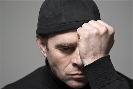 stress black & white portrait - Portrait of Man in Black Cap Stock Photo - Premium Royalty-Free, Code: 600-03404571