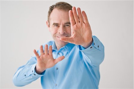 palmo - Man With Outstretched Hands Fotografie stock - Premium Royalty-Free, Codice: 600-03404588