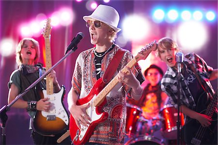 play guitar stage - Boys in Rock Band Stock Photo - Premium Royalty-Free, Code: 600-03404712