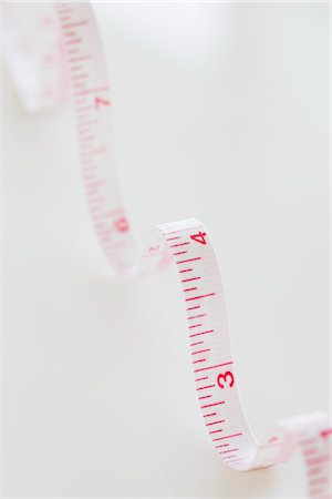 simsearch:600-07637016,k - Tape Measure Stock Photo - Premium Royalty-Free, Code: 600-03406385