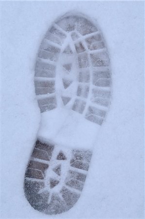 foot prints snow - Footprint in Snow Stock Photo - Premium Royalty-Free, Code: 600-03407543