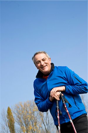 fit healthy seniors - Mature Man Outdoors with Walking Sticks Stock Photo - Premium Royalty-Free, Code: 600-03403969