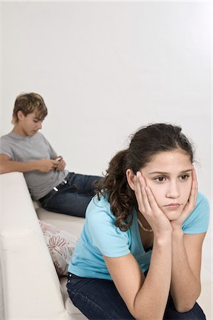 sister fights brother - Teenage Couple Having Argument Stock Photo - Premium Royalty-Free, Code: 600-03403994