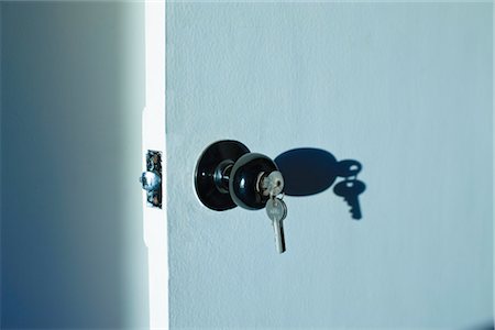 doorknobs - Keys in Door Lock Stock Photo - Premium Royalty-Free, Code: 600-03439328