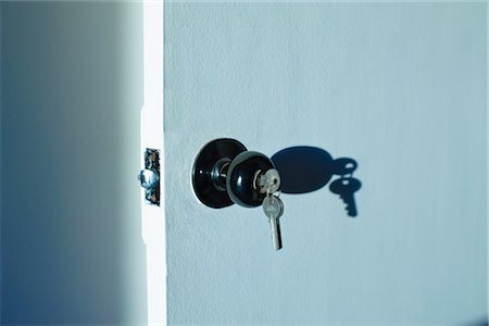 simsearch:694-03694099,k - Keys in Door Lock Stock Photo - Premium Royalty-Free, Code: 600-03439328