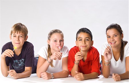 sweets indian - Portrait of Four Children Stock Photo - Premium Royalty-Free, Code: 600-03456246