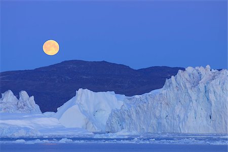 sky colors full moon - Iceberg, Disko Bay, Jakobshavn Glacier, Ilulissat, Greenland Foto de stock - Sin royalties Premium, Código: 600-03456663