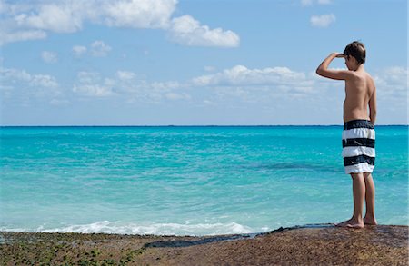 pubertad - Boy Looking at Caribbean Sea, Playa del Carmen, Yucatan Peninsula, Mexico Foto de stock - Sin royalties Premium, Código: 600-03456873