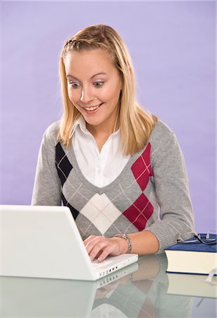 simsearch:600-07584758,k - Young Woman Using Laptop Computer Foto de stock - Sin royalties Premium, Código: 600-03451507