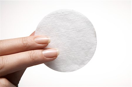 Close-up of Woman Holding Cotton Pad Stock Photo - Premium Royalty-Free, Code: 600-03466756