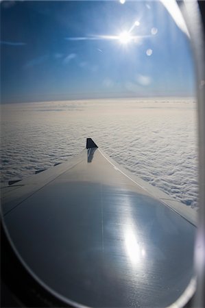 plane above cloud - View from Airplane Window Stock Photo - Premium Royalty-Free, Code: 600-03484707