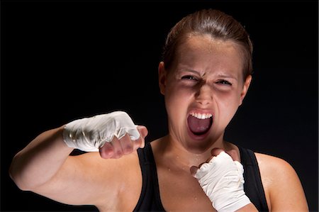 female fighter - Portrait de boxeur Photographie de stock - Premium Libres de Droits, Code: 600-03490329