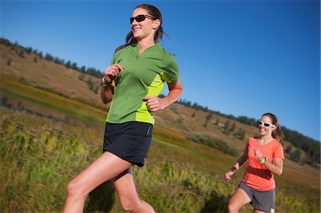 Two Women Jogging, Near Steamboat Springs, Colorado, USA Stock Photo - Premium Royalty-Free, Code: 600-03503171