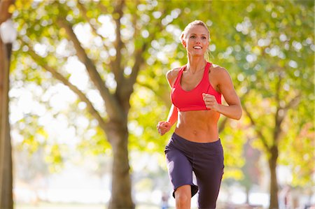 Woman Running in the Park, Seattle, Washington, USA Stock Photo - Premium Royalty-Free, Code: 600-03520576