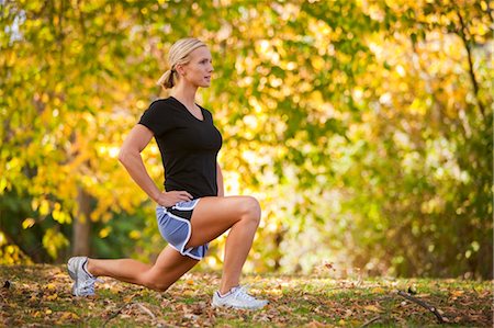 female jogger side view - Woman Stretching After a Run, Seattle, Washington, USA Stock Photo - Premium Royalty-Free, Code: 600-03520580