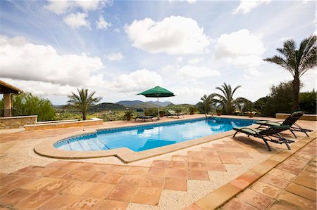 seating at the pool - Swimming Pool, Mallorca, Spain Stock Photo - Premium Royalty-Free, Code: 600-03586417