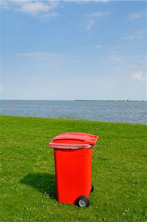 Red Garbage Bin Stock Photo - Premium Royalty-Free, Code: 600-03622661