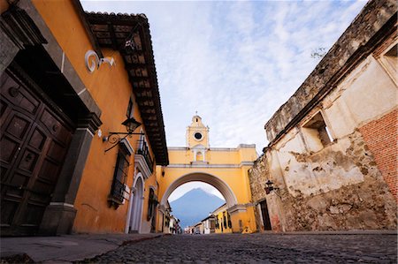 road into city low angle - Volcan de Agua Framed by El Arco, Antigua, Sacatepequez Department, Guatemala Stock Photo - Premium Royalty-Free, Code: 600-03638811
