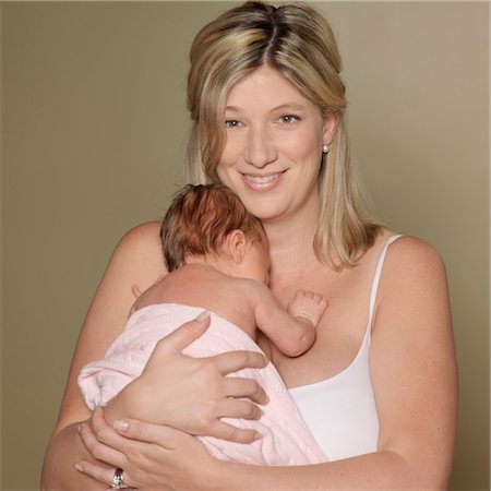 simsearch:600-03638846,k - Mother Holding Newborn Baby Stock Photo - Premium Royalty-Free, Code: 600-03638845