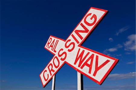 Railway Crossing Sign, Lake Magadi, Rift Valley Lakes, Kenya Stock Photo - Premium Royalty-Free, Code: 600-03638862