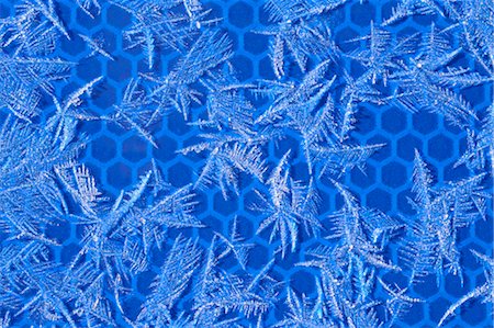 Nahaufnahme der Frost auf blauem Hintergrund Stockbilder - Premium RF Lizenzfrei, Bildnummer: 600-03644564