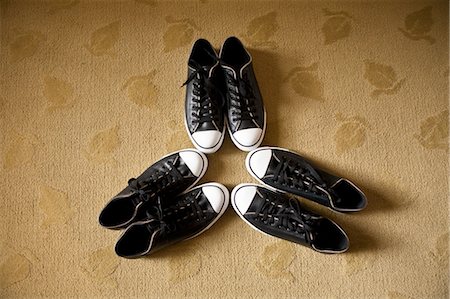 sneaker not people - Three Pairs of Shoes Stock Photo - Premium Royalty-Free, Code: 600-03659136