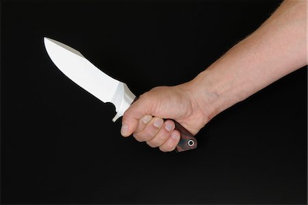 Hand Holding Knife Foto de stock - Sin royalties Premium, Código: 600-03685871