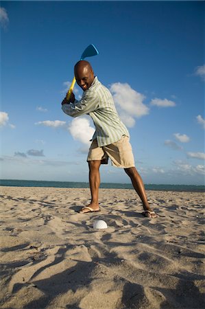 simsearch:600-03230431,k - Man Playing Golf on the Beach, Florida, USA Stock Photo - Premium Royalty-Free, Code: 600-03682204