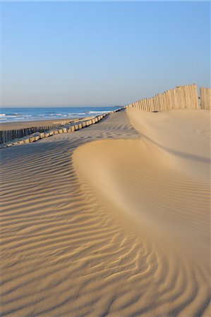 ripple sand dunes - Sand Fence at Beach near Cadiz, Costa De La Luz, Cadiz Province, Andalusia, Spain Stock Photo - Premium Royalty-Free, Code: 600-03682242