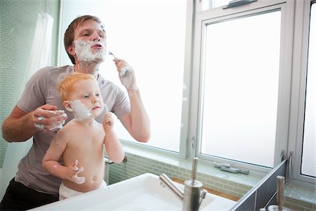 simsearch:640-02770419,k - Father and Son Shaving in Bathroom, Portland, Oregon, USA Stock Photo - Premium Royalty-Free, Code: 600-03696767