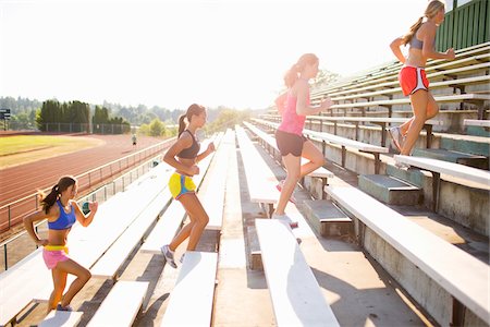 Teenagers Running up Bleachers at Race Track, Lake Oswego, Oregon, USA Stock Photo - Premium Royalty-Free, Code: 600-03696760