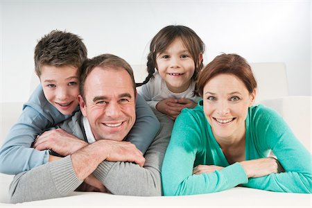 smile group white background - Portrait of Family Stock Photo - Premium Royalty-Free, Code: 600-03697906