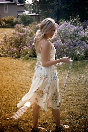 Woman Walking in Garden, High Park, Toronto, Ontario, Canada Stock Photo - Premium Royalty-Free, Code: 600-03715407