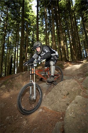 Man Mountain Biking on Mount Seymour, Mount Seymour Provincial Park, North Vancouver, British Columbia, Canada Stock Photo - Premium Royalty-Free, Code: 600-03719414