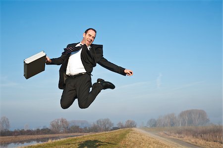 estasi - Businessman Jumping Fotografie stock - Premium Royalty-Free, Codice: 600-03734606