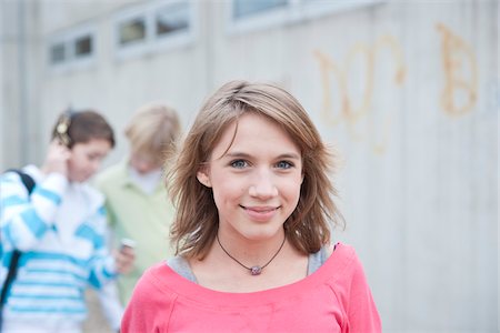 Teenagers in Schoolyard Stock Photo - Premium Royalty-Free, Code: 600-03734609